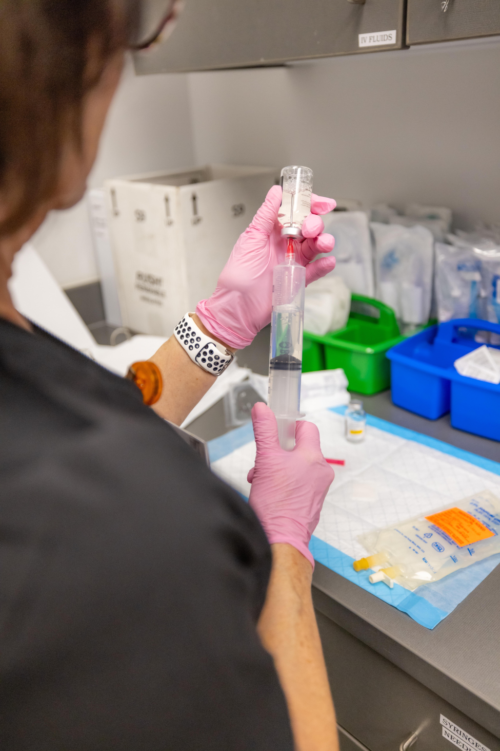 Photo of nurse handling the drug Kisunla before administering it. (Photo by UTHealth Houston)